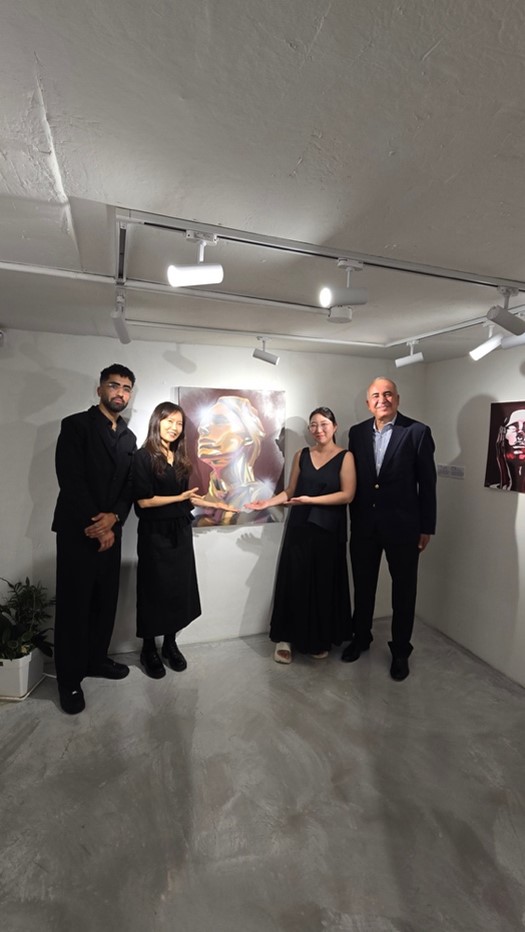 Photo with artist Ahmed on the far left and the Ambassador of Tunisia on the far right