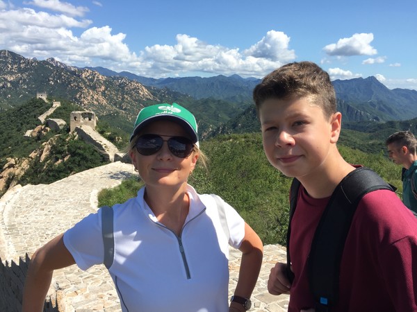 On the Great Wall of China in 2016 with Mrs. Maria Zinovieva and her son